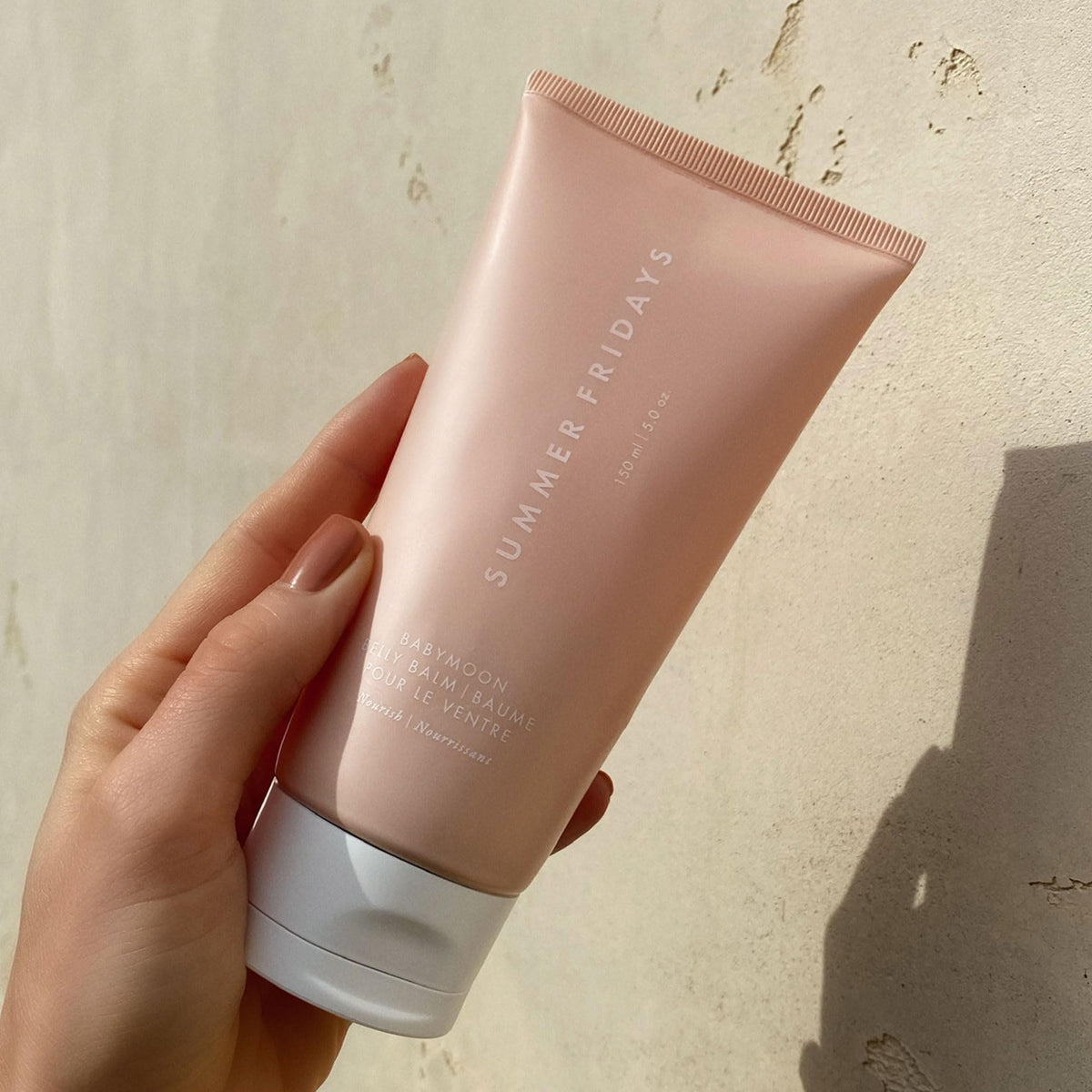 Summer Fridays Babymoon Belly Balm lifestyle shot on dresser