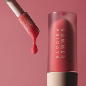 Summer Fridays Dream Lip Oil Pink Cloud with other beauty products