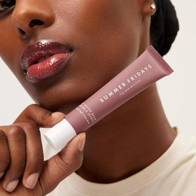 Summer Fridays Lip Butter Balm applied to lips for a glossy finish