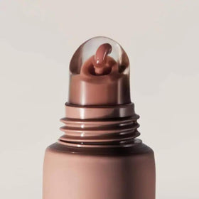 Summer Fridays Lip Butter Balm in a stylish cosmetic bag