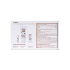 Sun Bum Mineral Road Tripper kit laid out on a beach towel