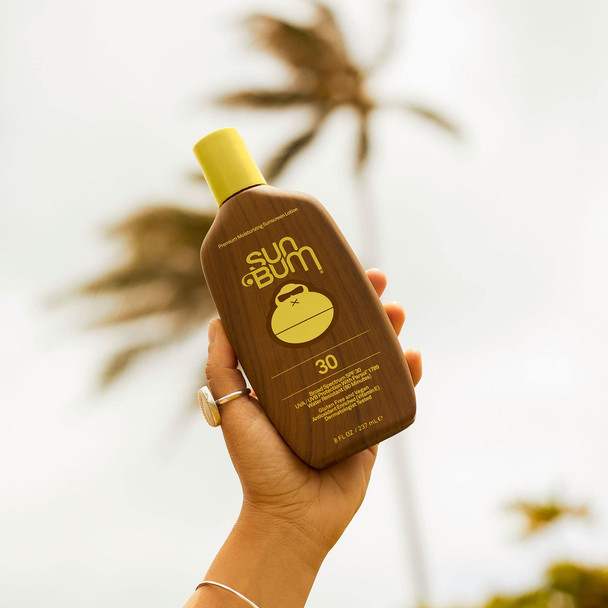 Sun Bum sunscreen lotion application on skin