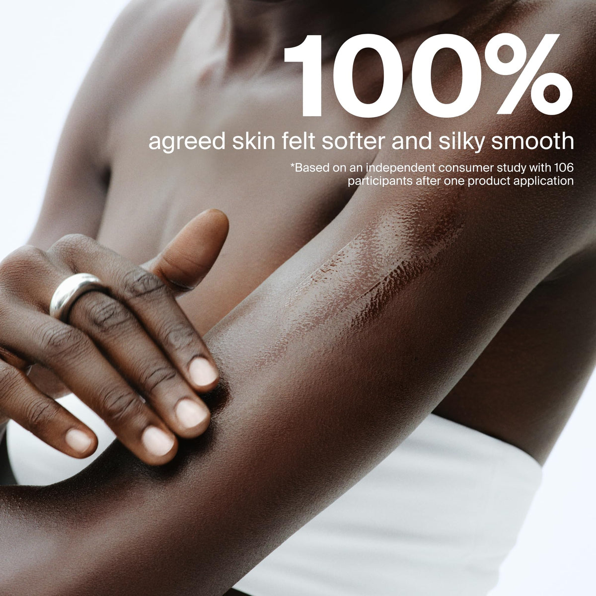 Supergoop! Glow Oil in a bathroom setting after shower