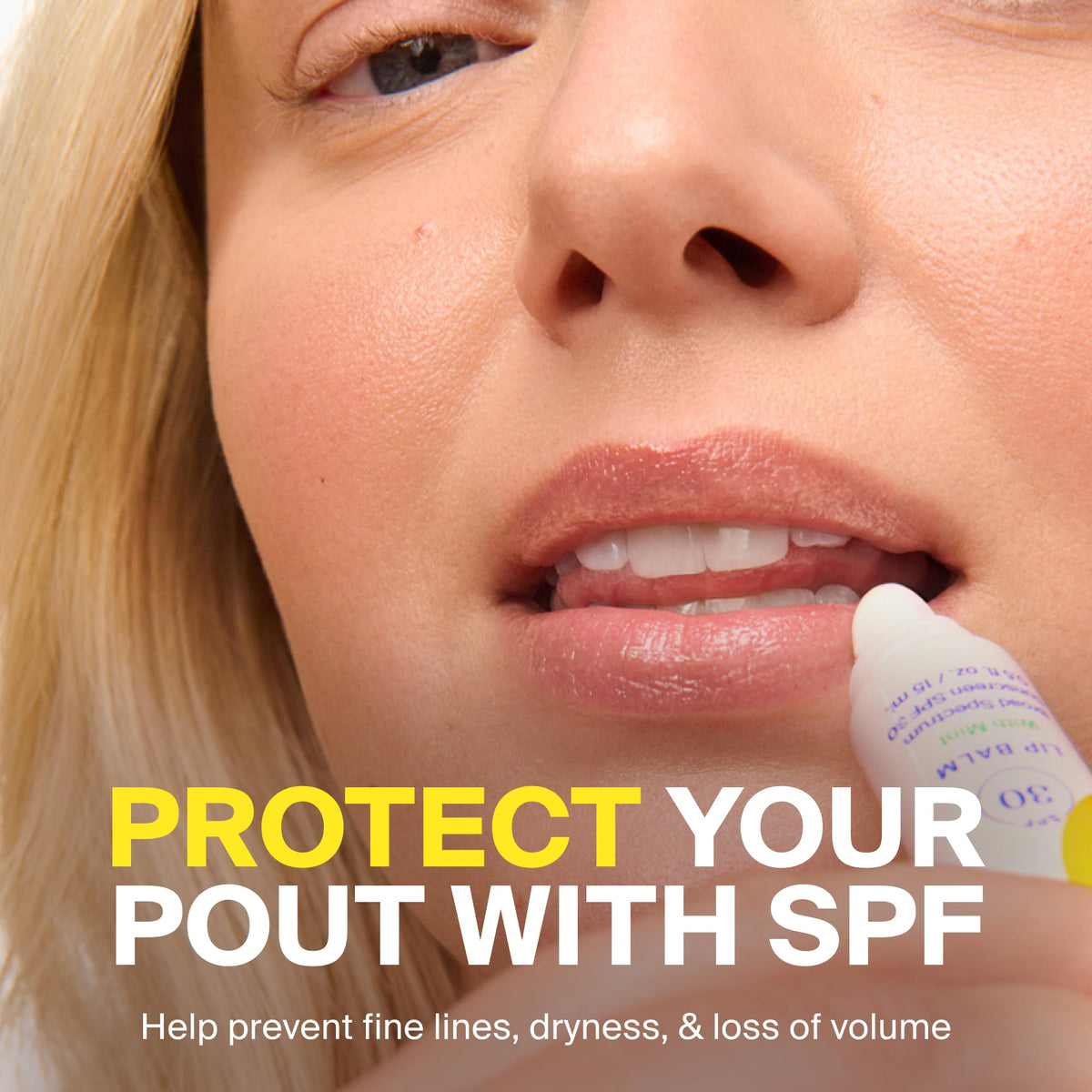 Supergoop! PLAY Lip Balm SPF 30 against outdoor background