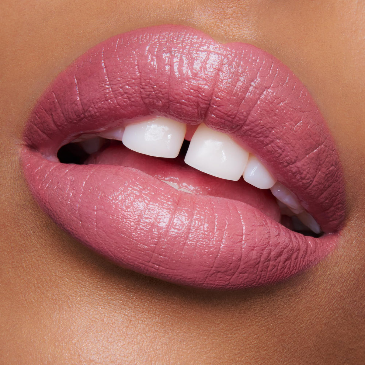 Swatch of Charlotte Tilbury K.I.S.S.I.N.G Lipstick on skin
