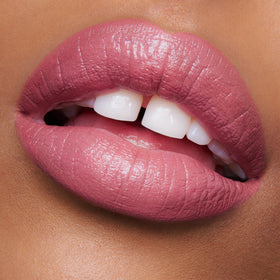 Swatch of Charlotte Tilbury K.I.S.S.I.N.G Lipstick on skin