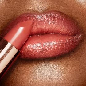 Swatch of Charlotte Tilbury K.I.S.S.I.N.G Lipstick on skin