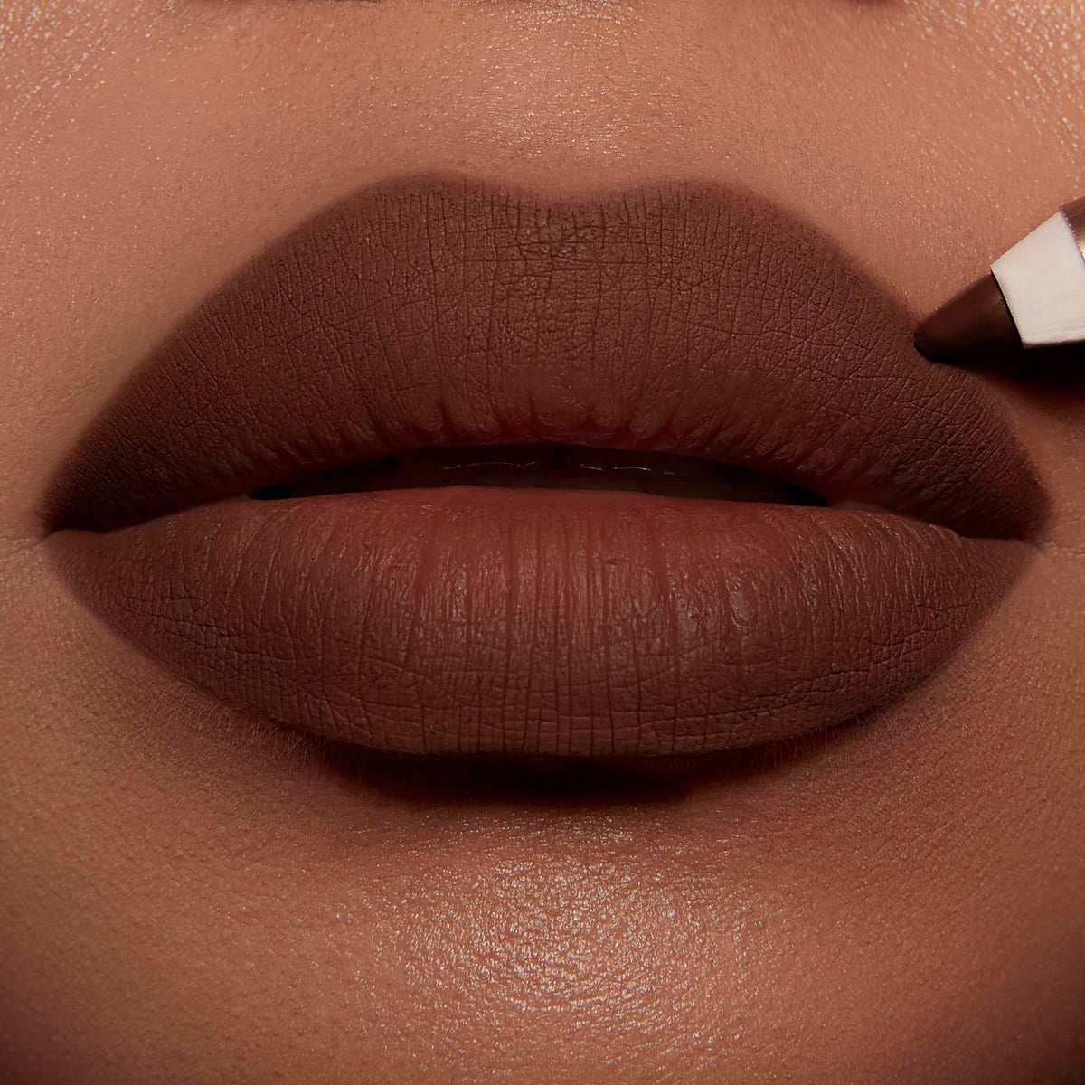 Swatch of Charlotte Tilbury Lip Cheat Waterproof Lip Liner on skin