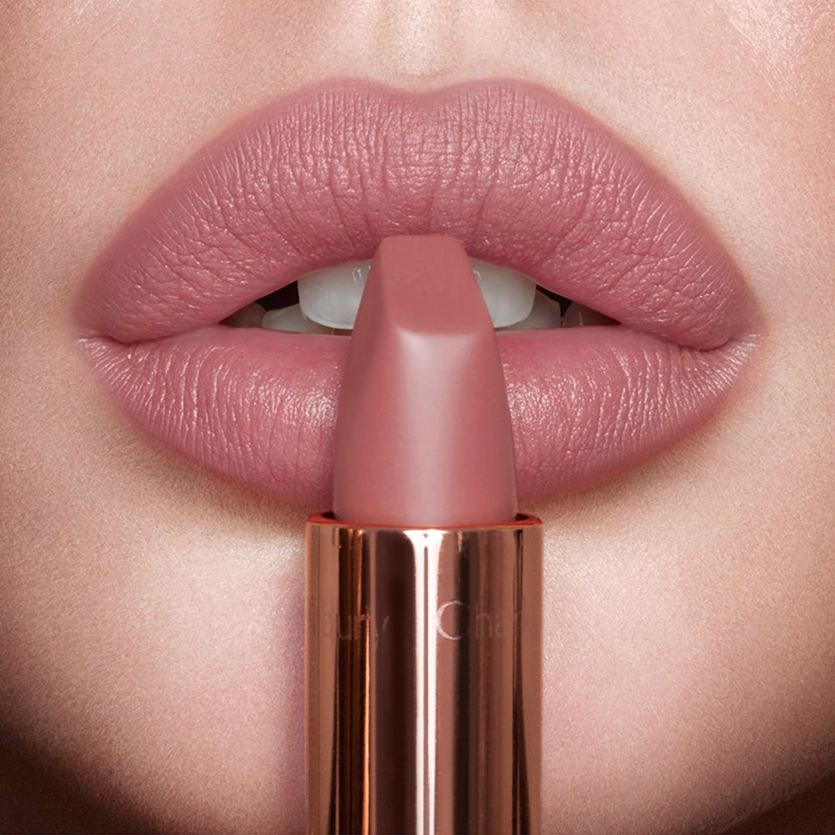 Swatch of Charlotte Tilbury Matte Revolution Lipstick on skin