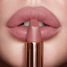 Swatch of Charlotte Tilbury Matte Revolution Lipstick on skin