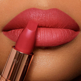 Swatch of Charlotte Tilbury Matte Revolution Lipstick on skin