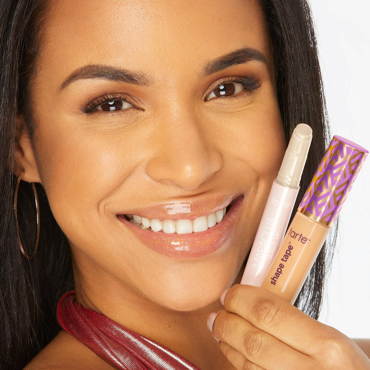 swatch of Maracuja Juicy Lip Balm on lips