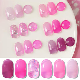Swatch of milky jelly pink gel nail polish on nails
