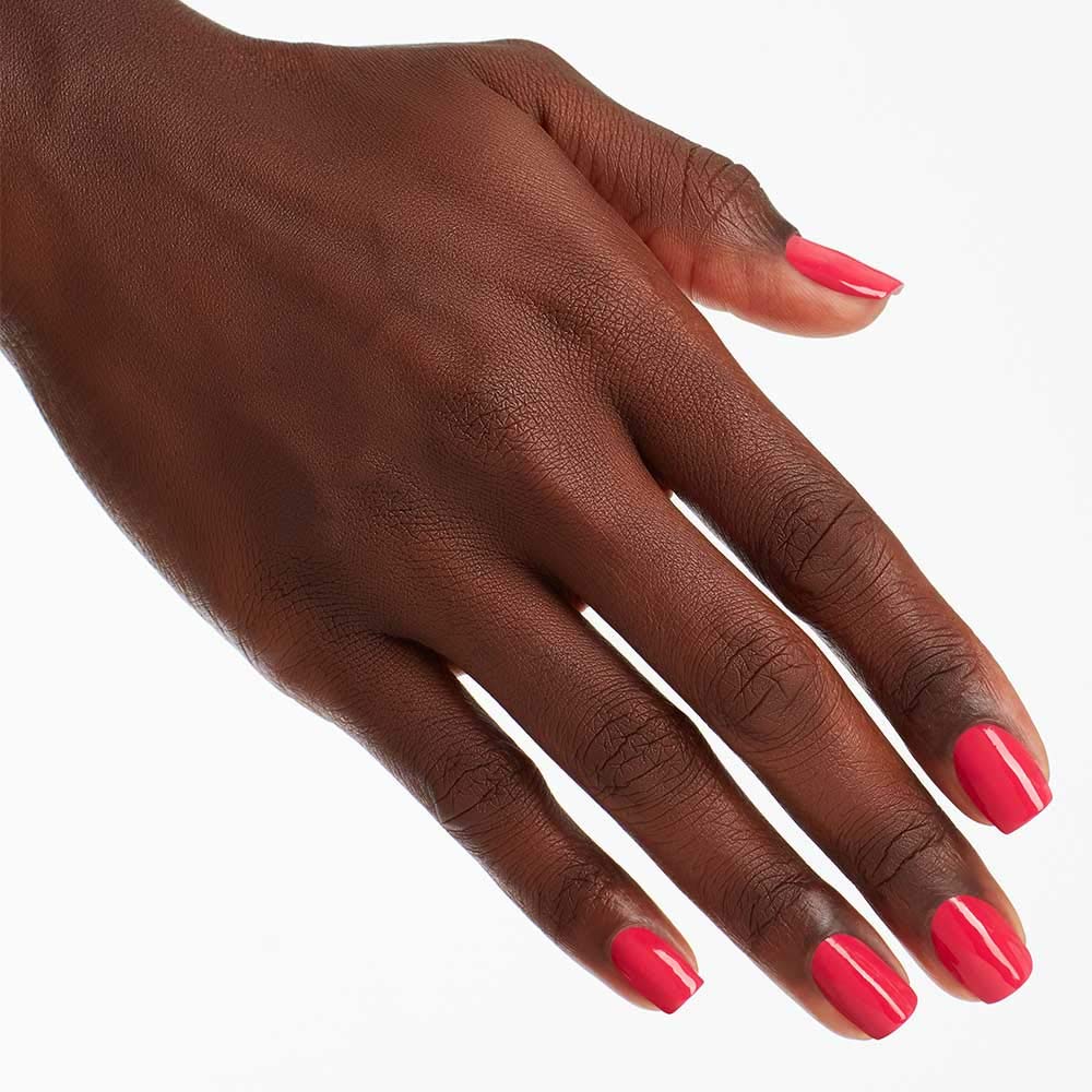 Swatch of OPI Charged Up Cherry nail polish on nail