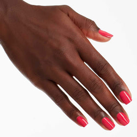 Swatch of OPI Charged Up Cherry nail polish on nail