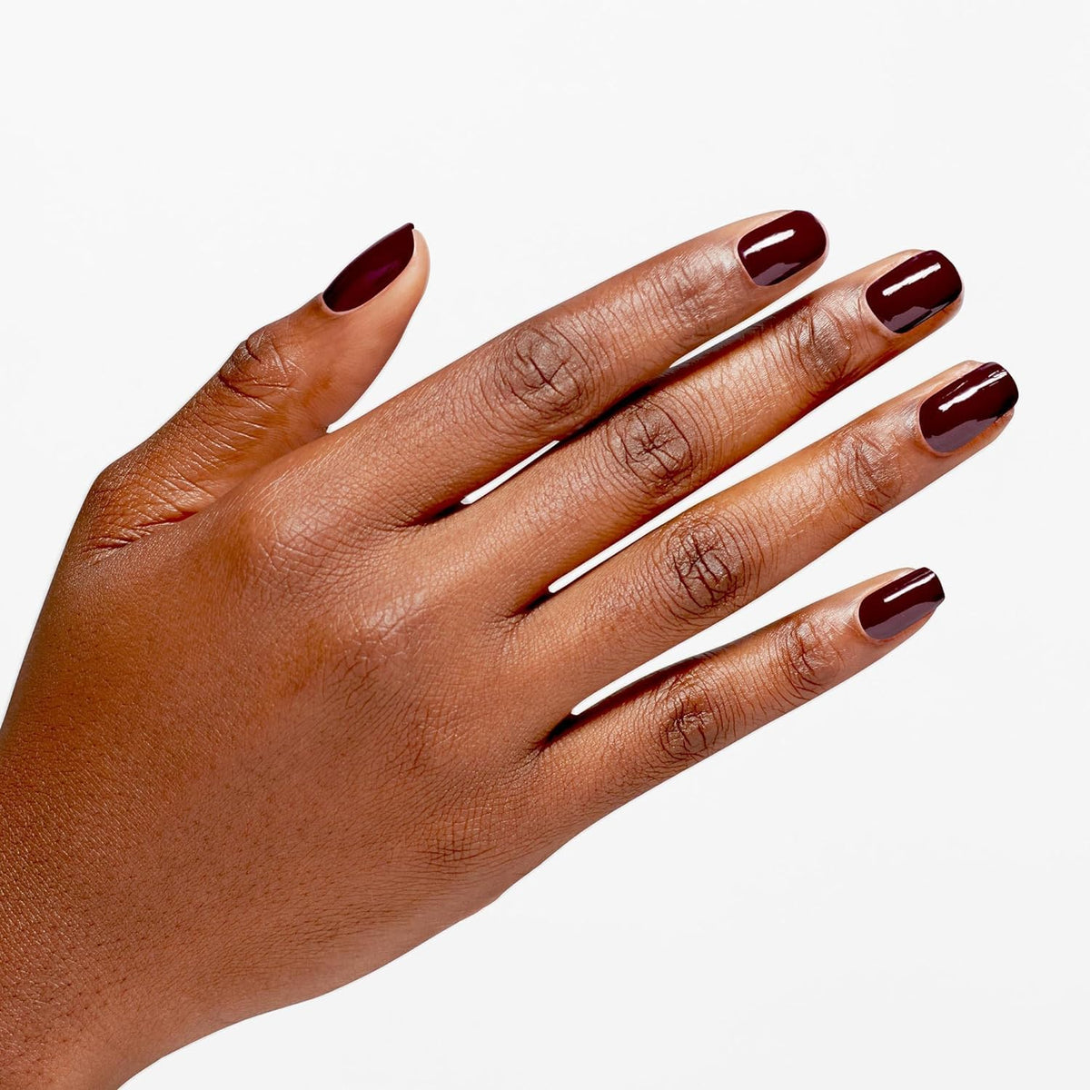 Swatch of OPI Infinite Shine Raisin the Bar on a nail