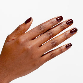 Swatch of OPI Infinite Shine Raisin the Bar on a nail