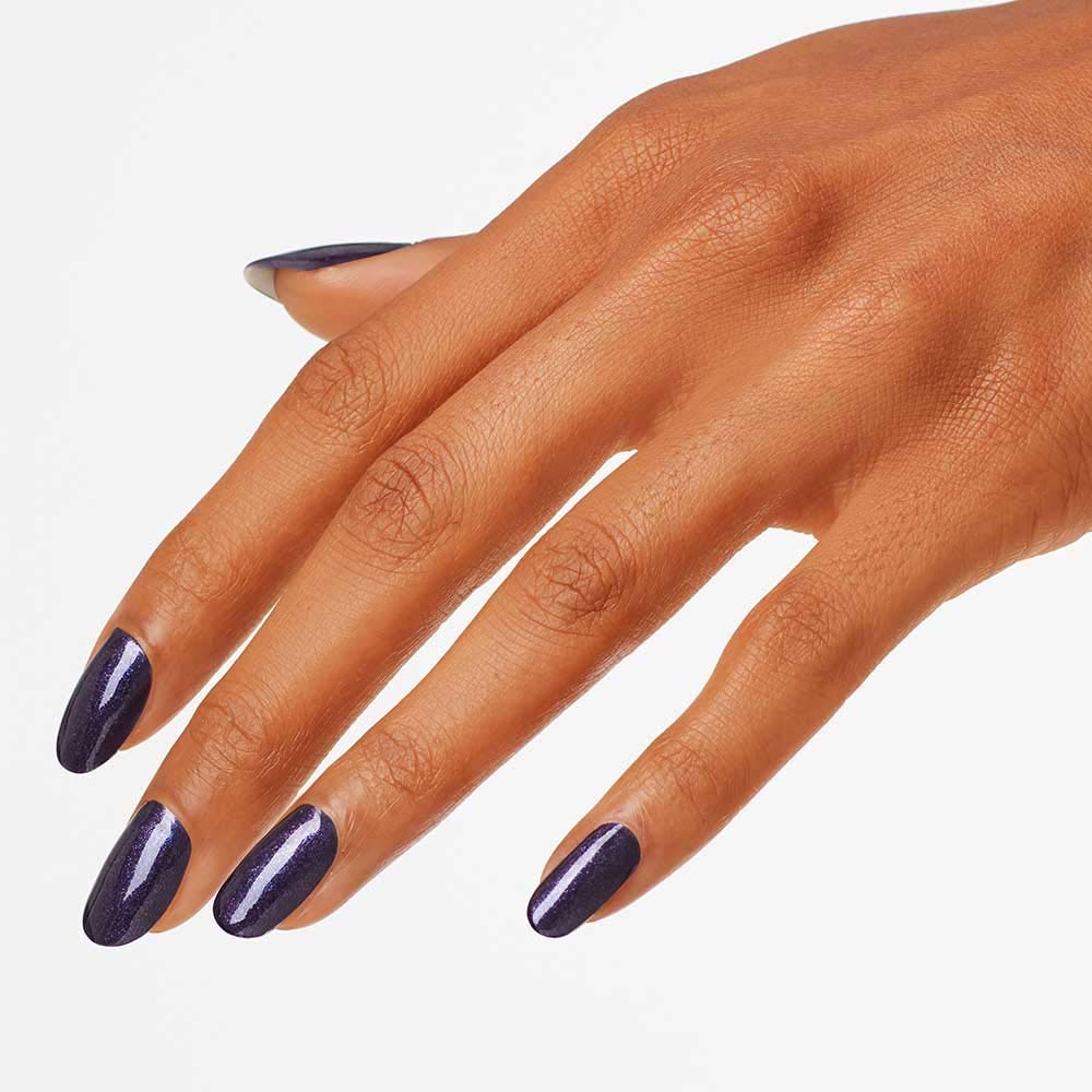 Swatch of OPI Ink dark purple shimmer on nails