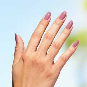 Swatch of OPI Nature Strong soft pink nail polish on nails