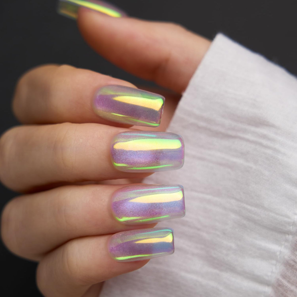 Swatch of Pretty Diva Aurora Nail Powder on nails