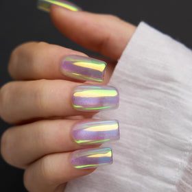 Swatch of Pretty Diva Aurora Nail Powder on nails