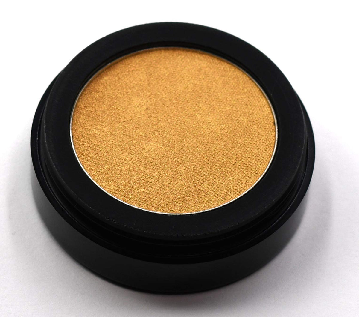 Swatch of Pure Ziva Shiny Gold Champagne Eyeshadow on skin
