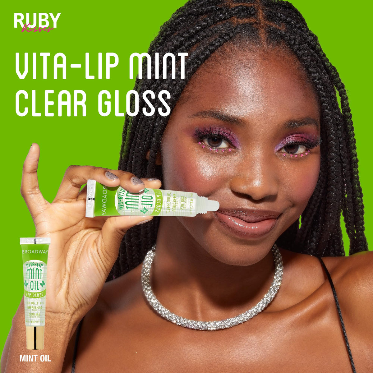 Swatch of Ruby Kisses Vita-Lip Gloss on a skin tone