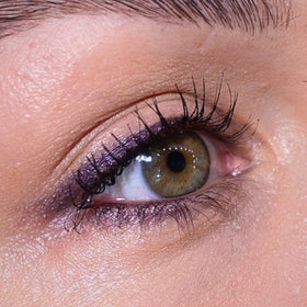 Swatch of Sandstone Scandinavia aubergine eyeliner on skin