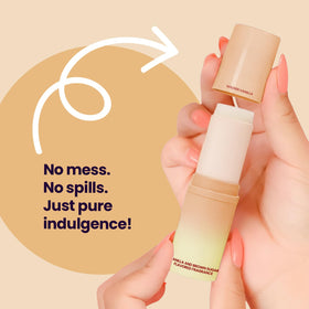 Sweetums Solid Perfume Stick placed on a vanity