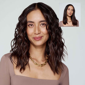 T3 SinglePass Curl X 1" curling iron in lifestyle setting with styled hair