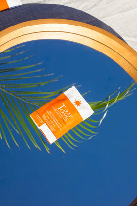 Tan Towel towelette application on skin