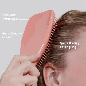TANGLE TEEZER brush being used on wet hair