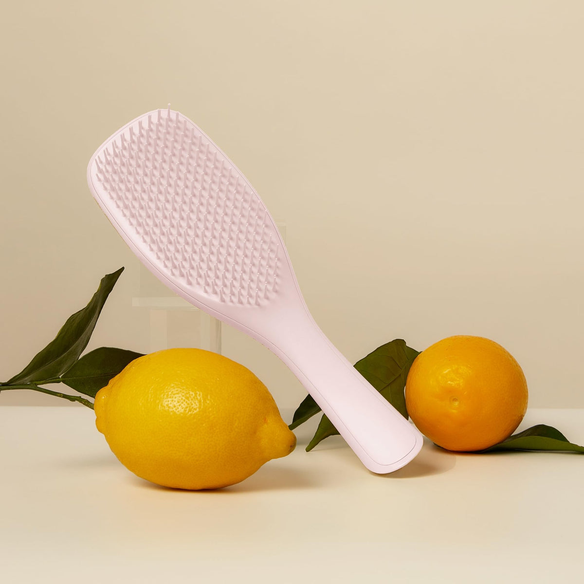 TANGLE TEEZER brush being used on wet hair