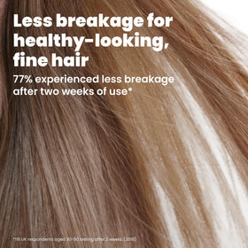 TANGLE TEEZER brush on a bathroom counter with hair products