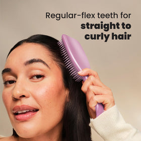 TANGLE TEEZER Chrome Ultimate Detangler Brush in use on wet hair