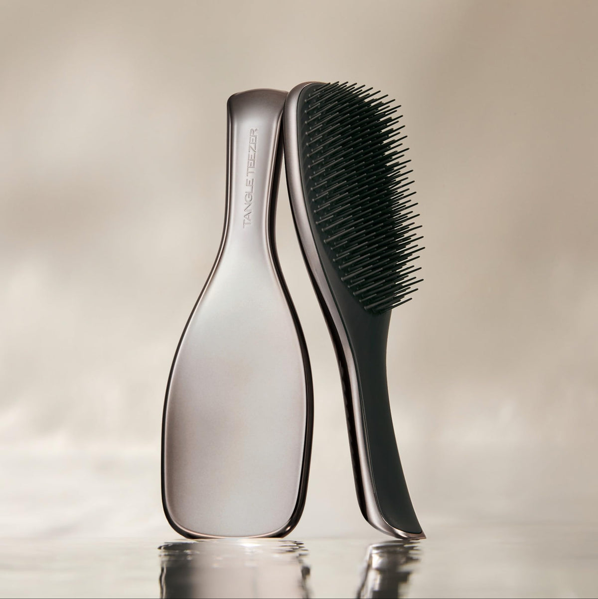 TANGLE TEEZER Chrome Ultimate Detangler Brush side view showing teeth
