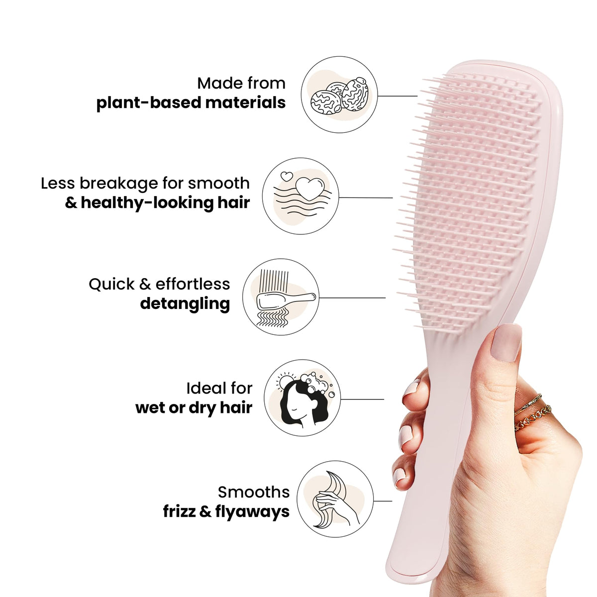 TANGLE TEEZER detangler brush on a bathroom counter