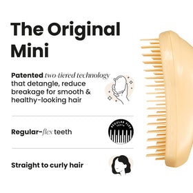 TANGLE TEEZER Mini Detangler Hair Brush on a bathroom counter