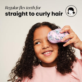 TANGLE TEEZER Mini Detangler Hair Brush Unicorn Magic in a child's hand