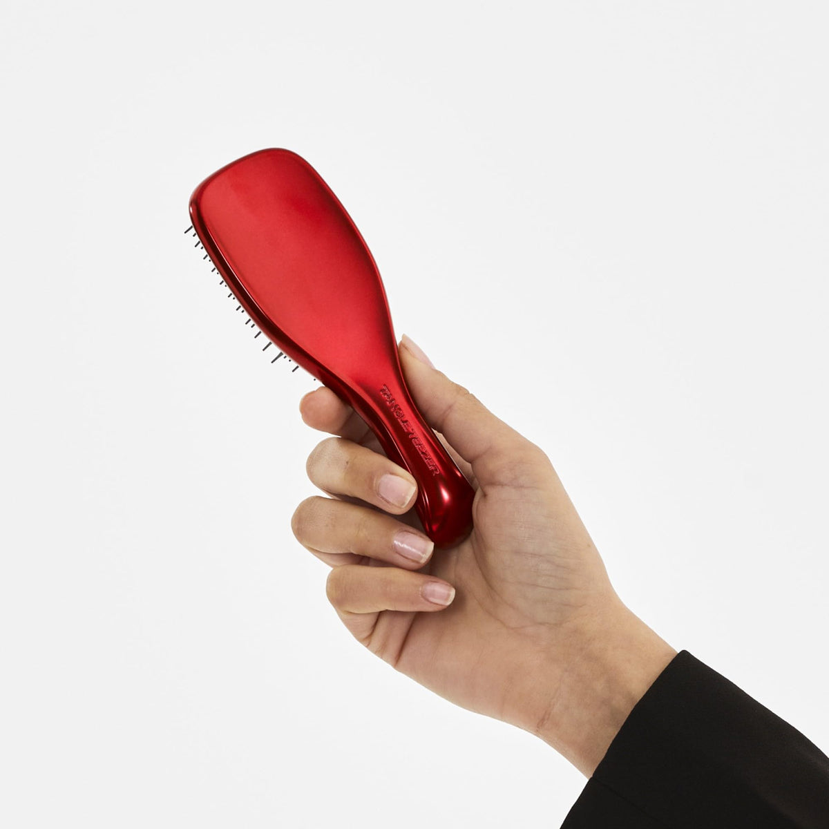 TANGLE TEEZER Mini Hair Brush Devil Wears Prada Red on a vanity