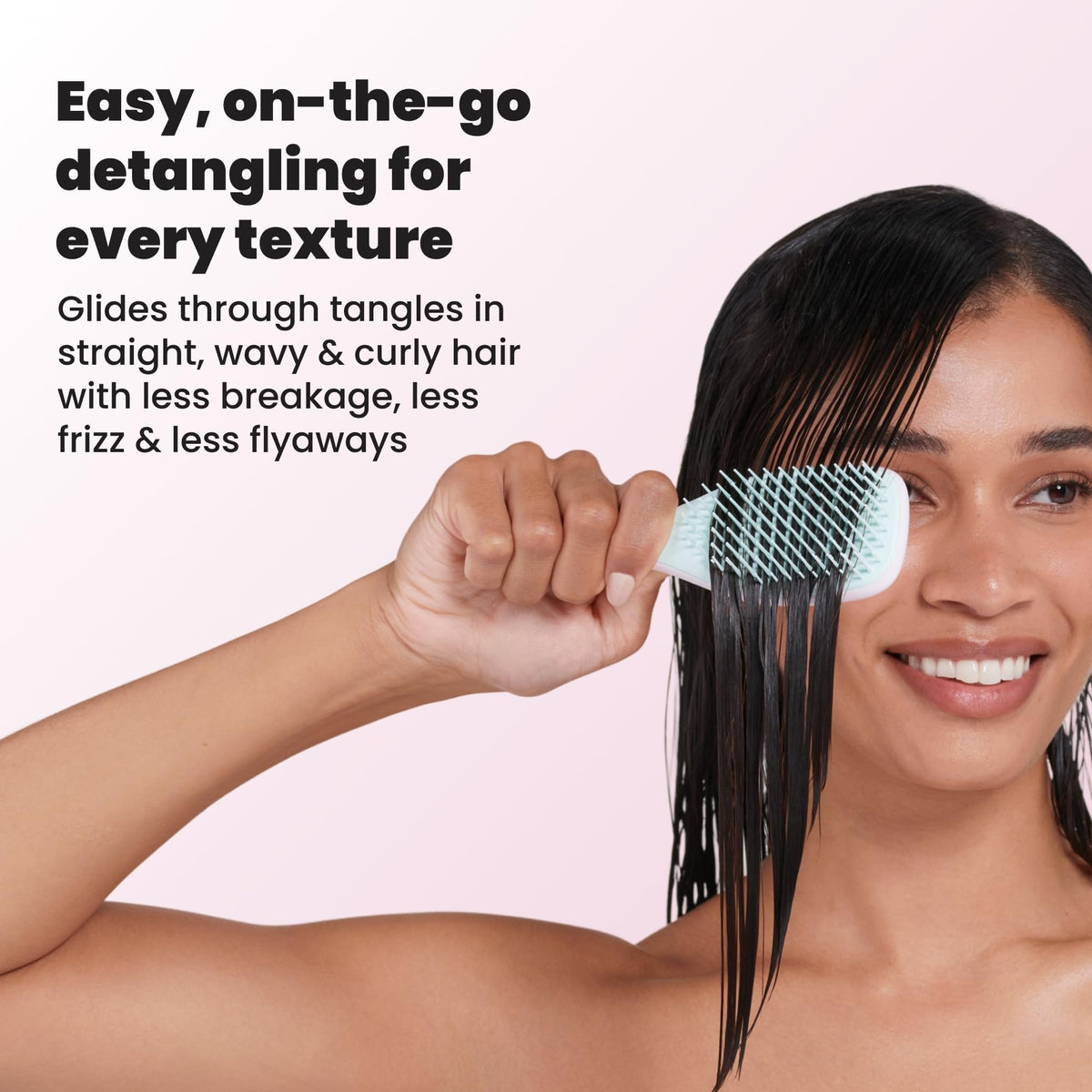 TANGLE TEEZER Mini Hair Brush in use on wet hair