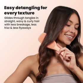 TANGLE TEEZER Ultimate Detangler Brush in use on dry hair