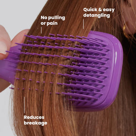 TANGLE TEEZER Ultimate Detangler Brush in use on wet hair