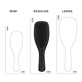 TANGLE TEEZER Ultimate Detangler Brush on a bathroom counter
