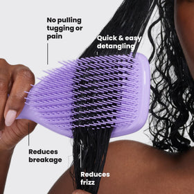 TANGLE TEEZER Ultimate Detangler Curly Hair Brush in use on wet hair