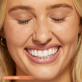 tarte Go With The Faux Freckle Stamp showing natural-looking freckles on skin