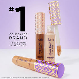 tarte Icons set on a vanity with beauty accessories