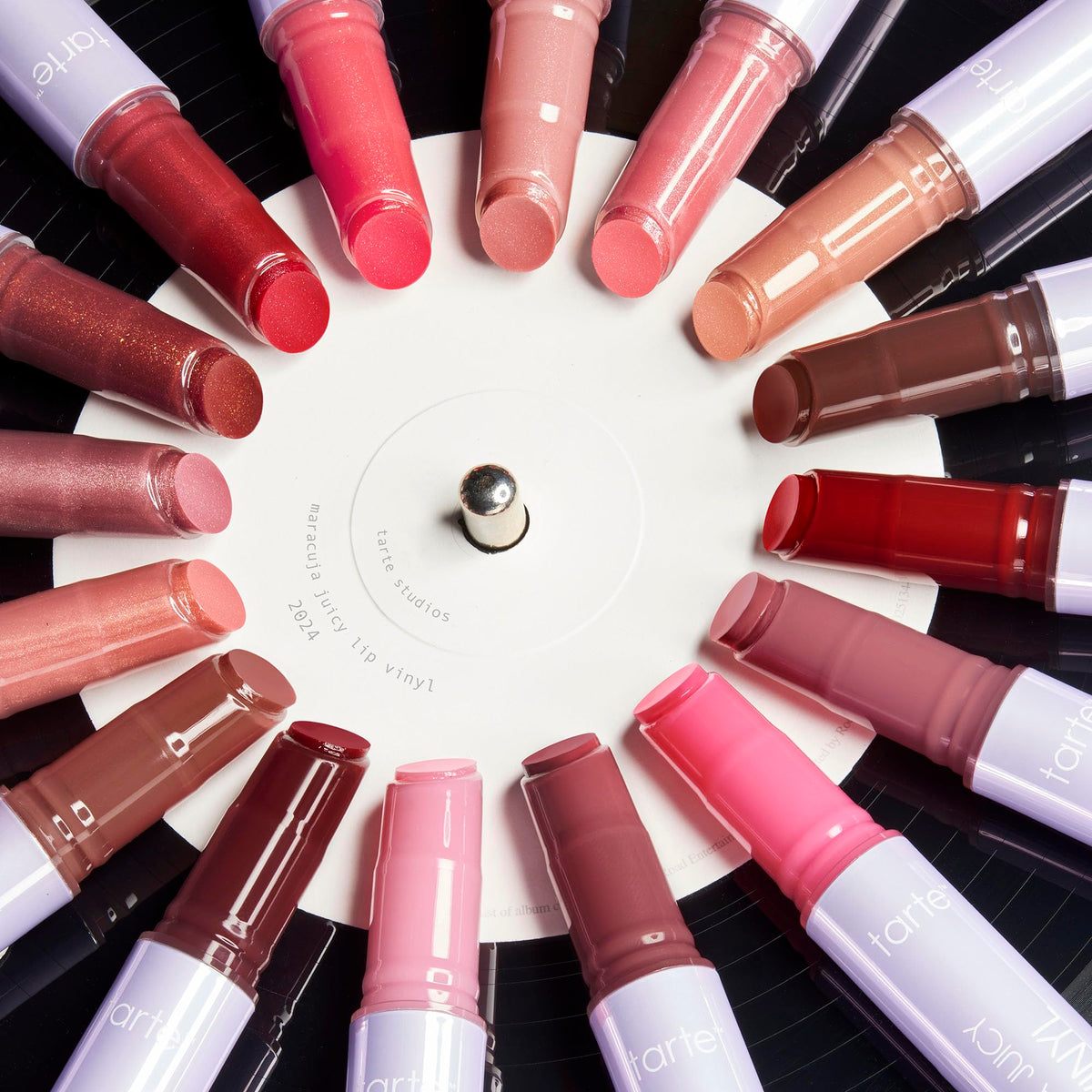 tarte Maracuja Juicy Lip Vinyl Gloss in makeup bag