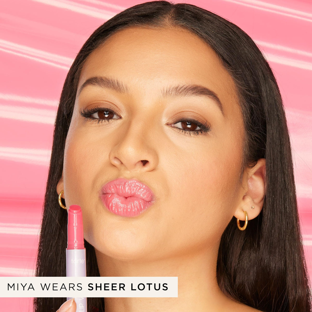 tarte Maracuja Juicy Lip Vinyl Gloss on model's lips