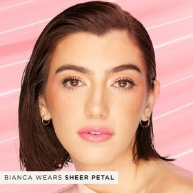 tarte Maracuja Juicy Lip Vinyl Gloss on model's lips